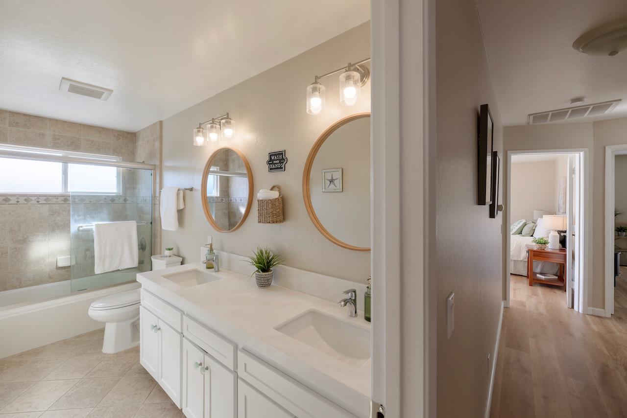 155 Rabbits Run Road Santa Cruz, CA 95060 - Photo 43 of 113 a bathroom with a toilet a sink and a mirror