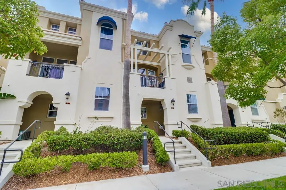 2221 Historic Decatur Road, Unit 61 San Diego, CA 92106 - Photo 1 of 29 a front view of a multi story residential apartment building