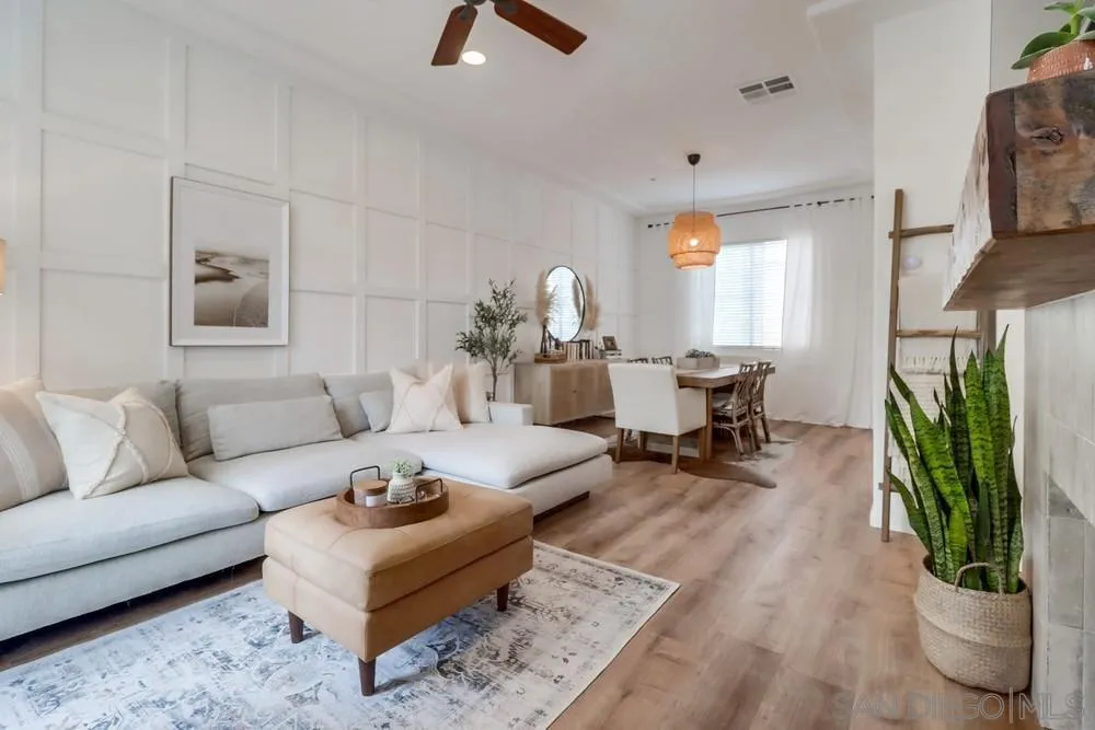2221 Historic Decatur Road, Unit 61 San Diego, CA 92106 - Photo 7 of 29 a living room with furniture and a large window