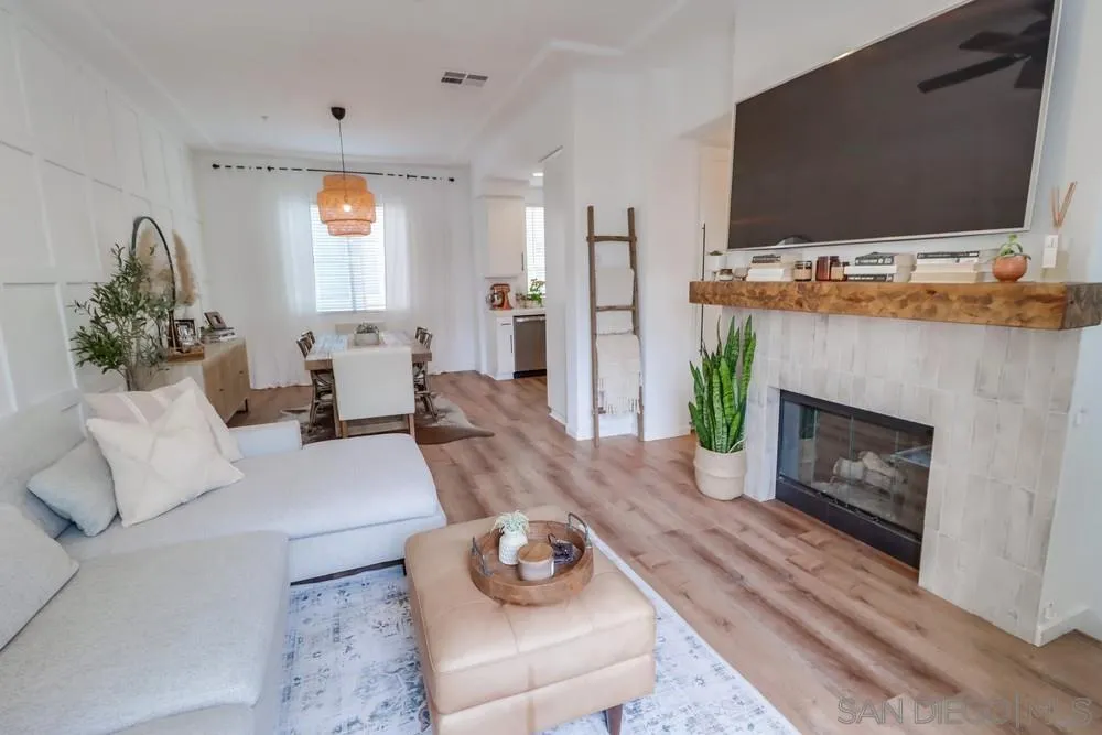 2221 Historic Decatur Road, Unit 61 San Diego, CA 92106 - Photo 9 of 29 a living room with furniture and a flat screen tv
