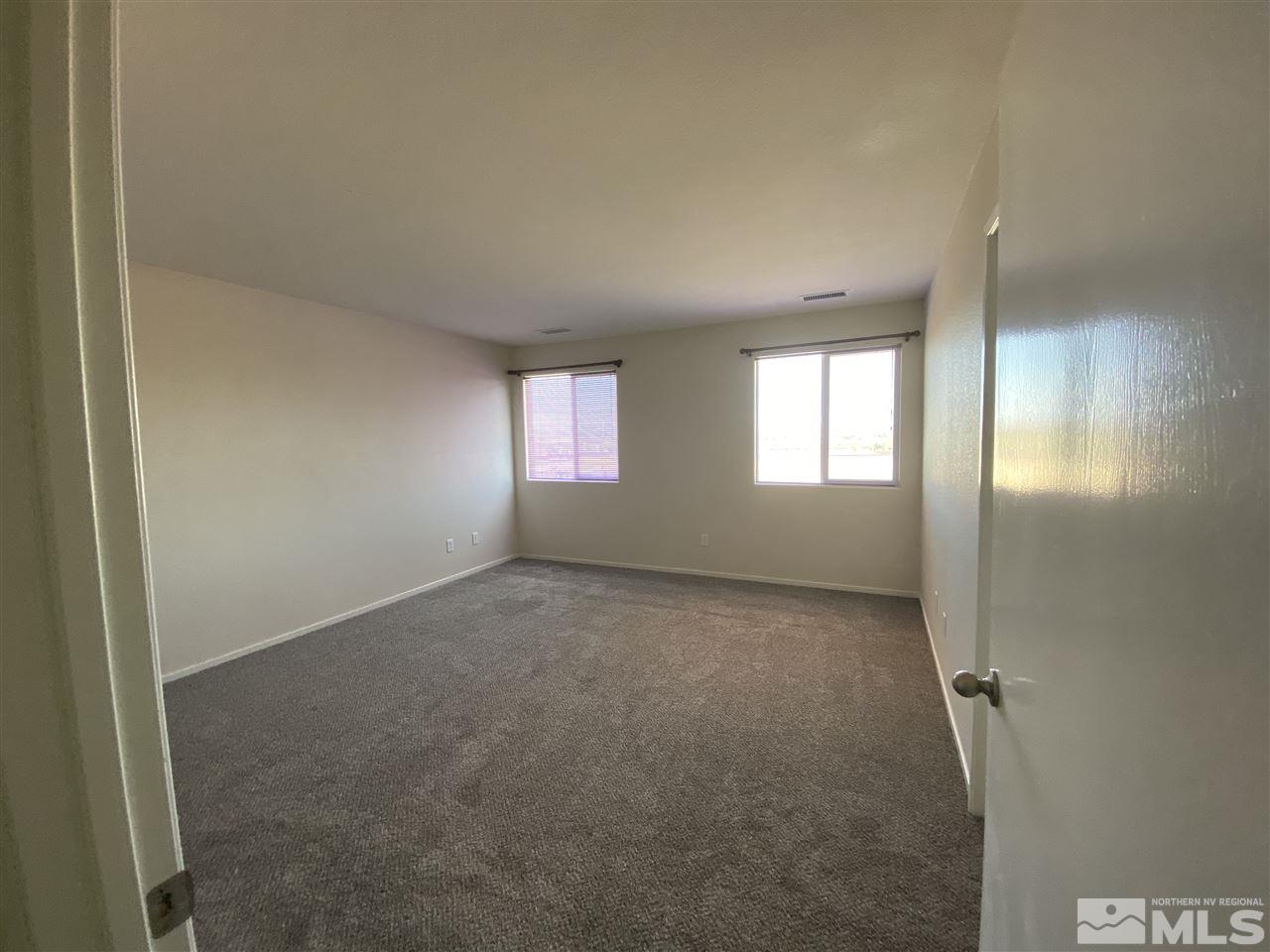 545 Verelli Court Reno, NV 89521 - Photo 8 of 16 a view of an empty room and window