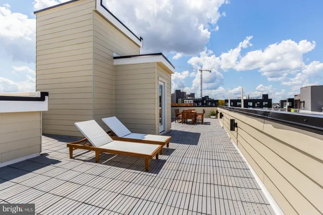 a building outdoor space with patio furniture