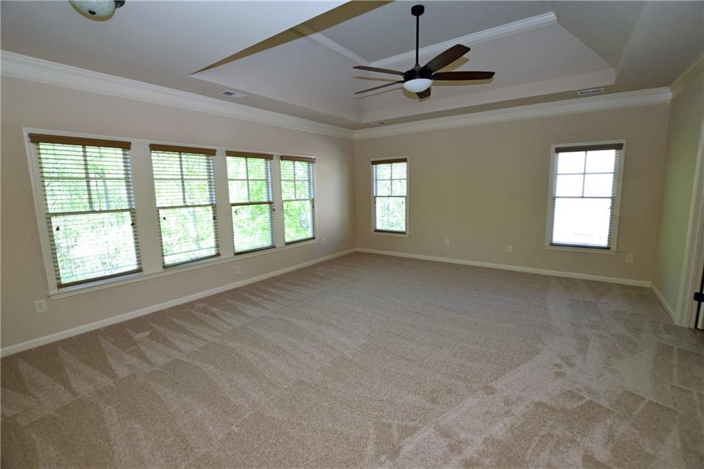 1630 Bramble Bush Way Suwanee, GA 30024 - Photo 12 of 31 a view of an empty room with a window