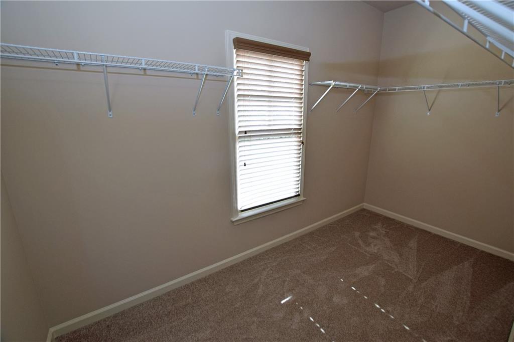 1630 Bramble Bush Way Suwanee, GA 30024 - Photo 21 of 31 a view of a room that has a window in it
