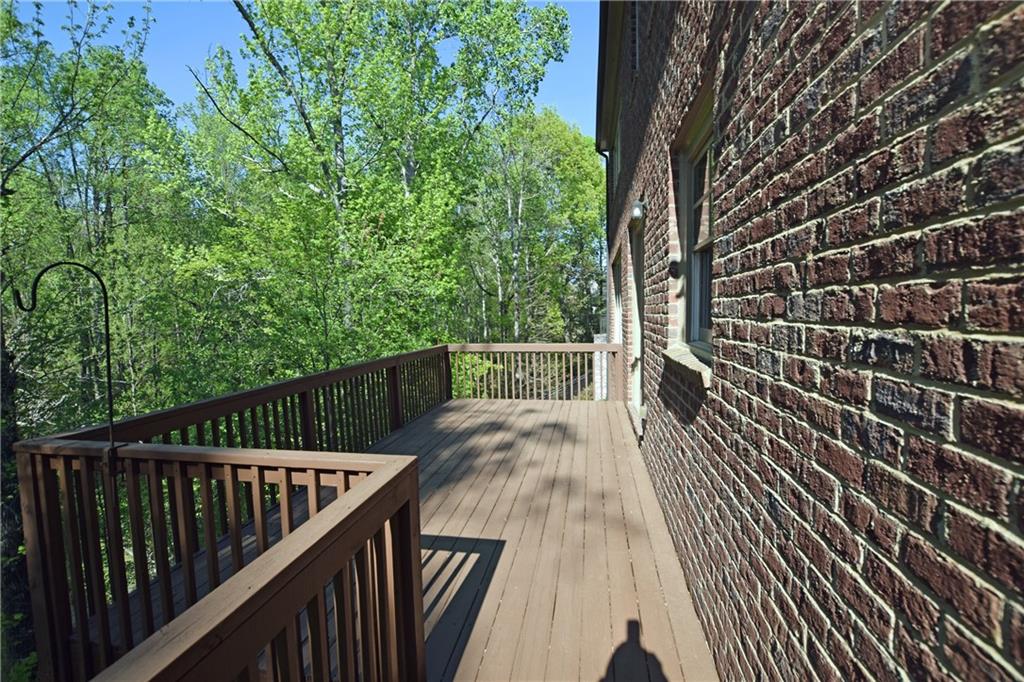 1630 Bramble Bush Way Suwanee, GA 30024 - Photo 23 of 31 a view of balcony with wooden floor
