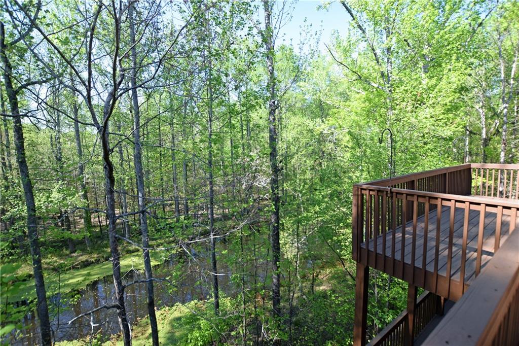 1630 Bramble Bush Way Suwanee, GA 30024 - Photo 24 of 31 a view of a balcony with an outdoor space