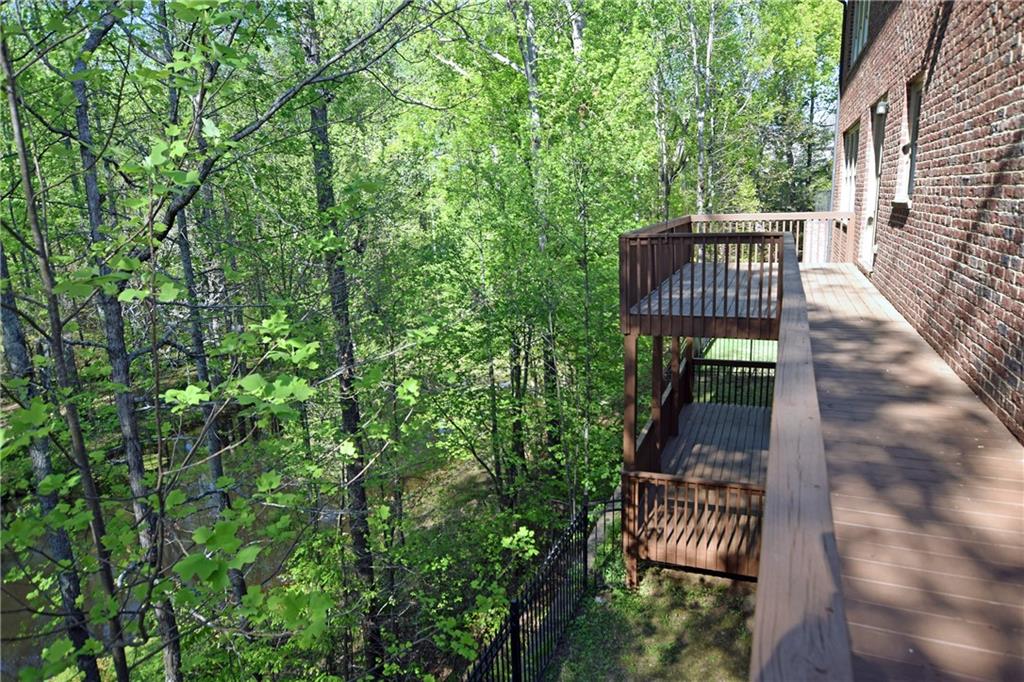 1630 Bramble Bush Way Suwanee, GA 30024 - Photo 25 of 31 a view of balcony with wooden floor