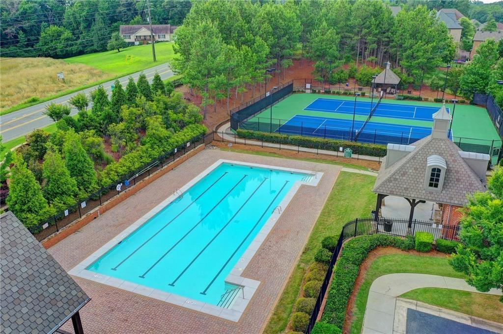 1630 Bramble Bush Way Suwanee, GA 30024 - Photo 31 of 31 a view of an outdoor space with a swimming pool
