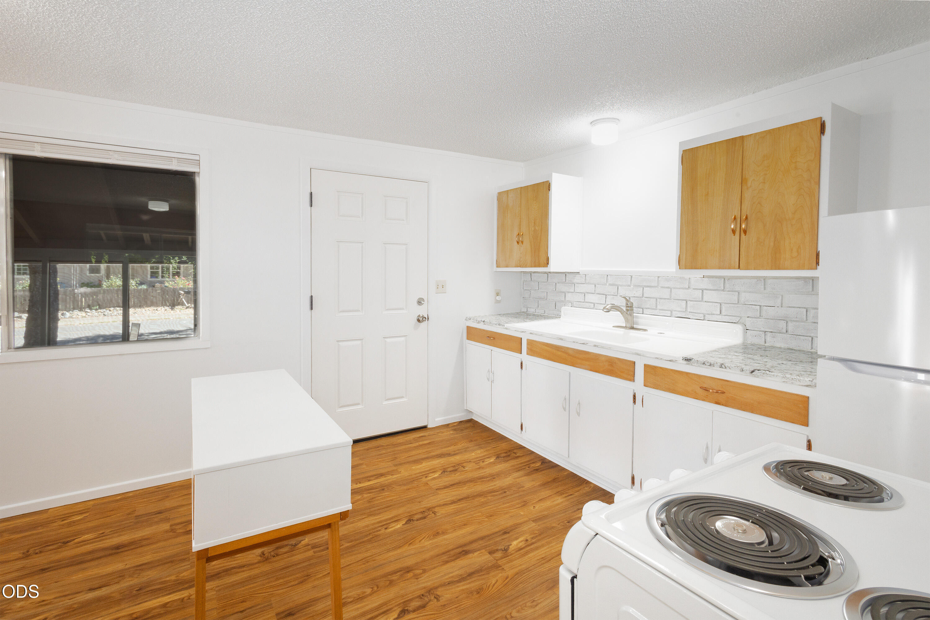 315 South Old Stage Road Cave Junction, OR 97523 - Photo 7 of 29 a bathroom with a sink a toilet and a shower