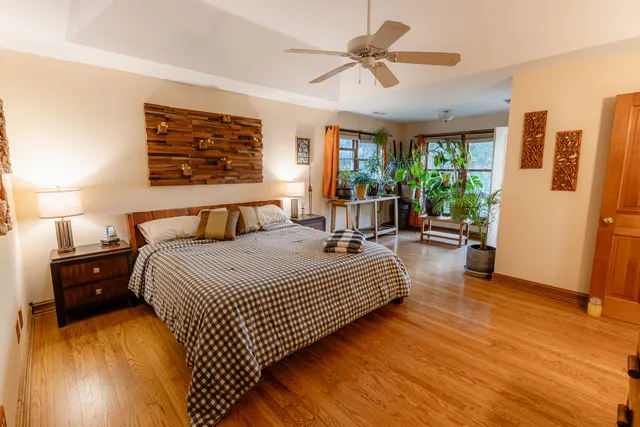 a bathroom with a sink a toilet and shower curtain