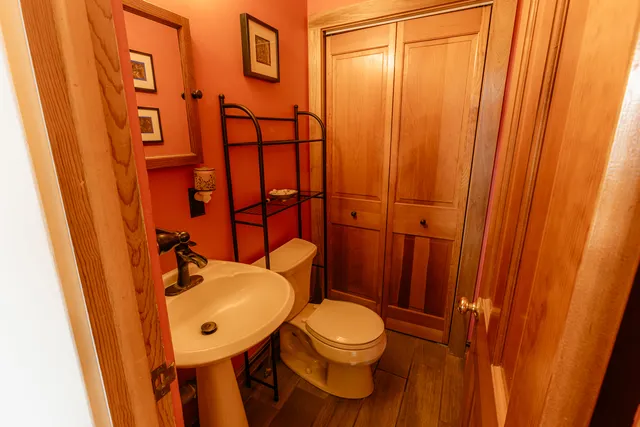a view of an entryway with wooden floor and windows