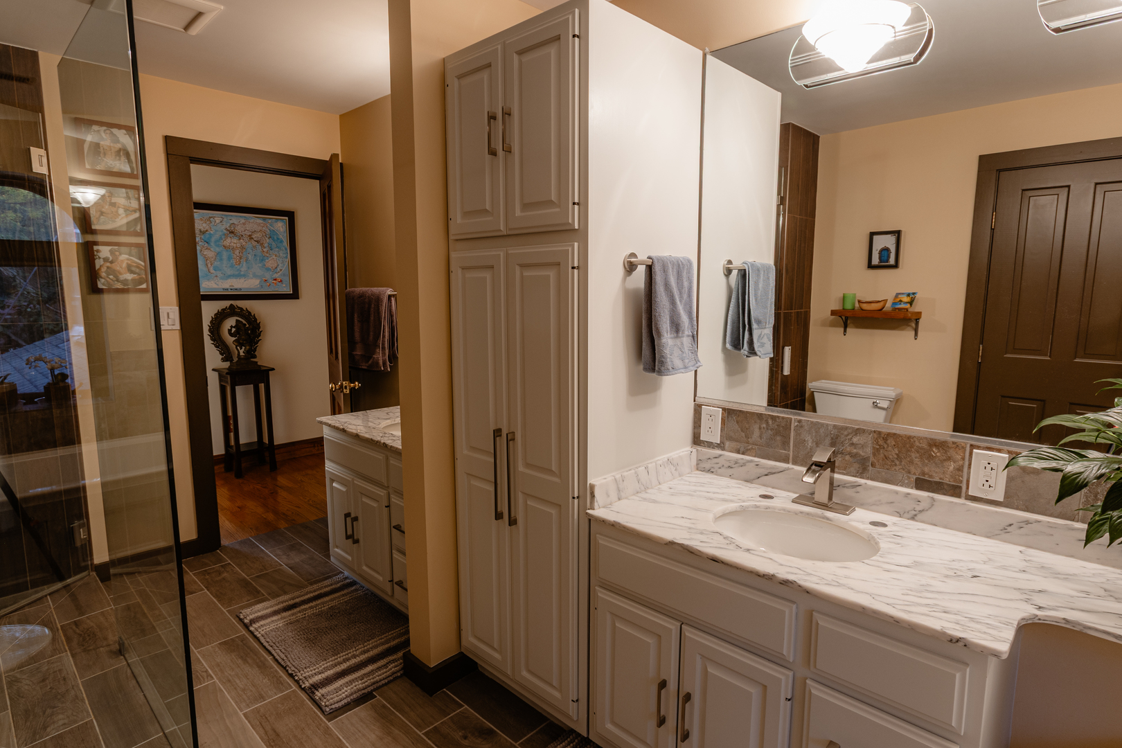 101 Beachway Drive Fox River Grove, IL 60021 - Photo 16 of 28 a en suite bathroom with a sink a mirror and a shower