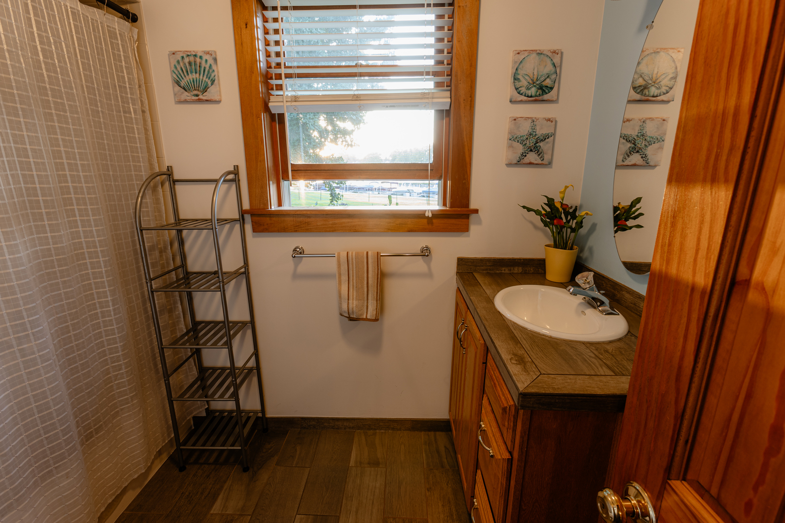 101 Beachway Drive Fox River Grove, IL 60021 - Photo 18 of 28 a bathroom with a sink and mirror