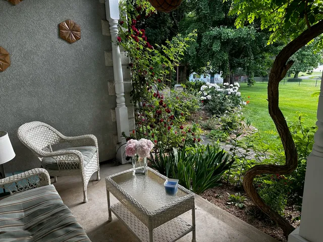 a view of a lake with houses in the back
