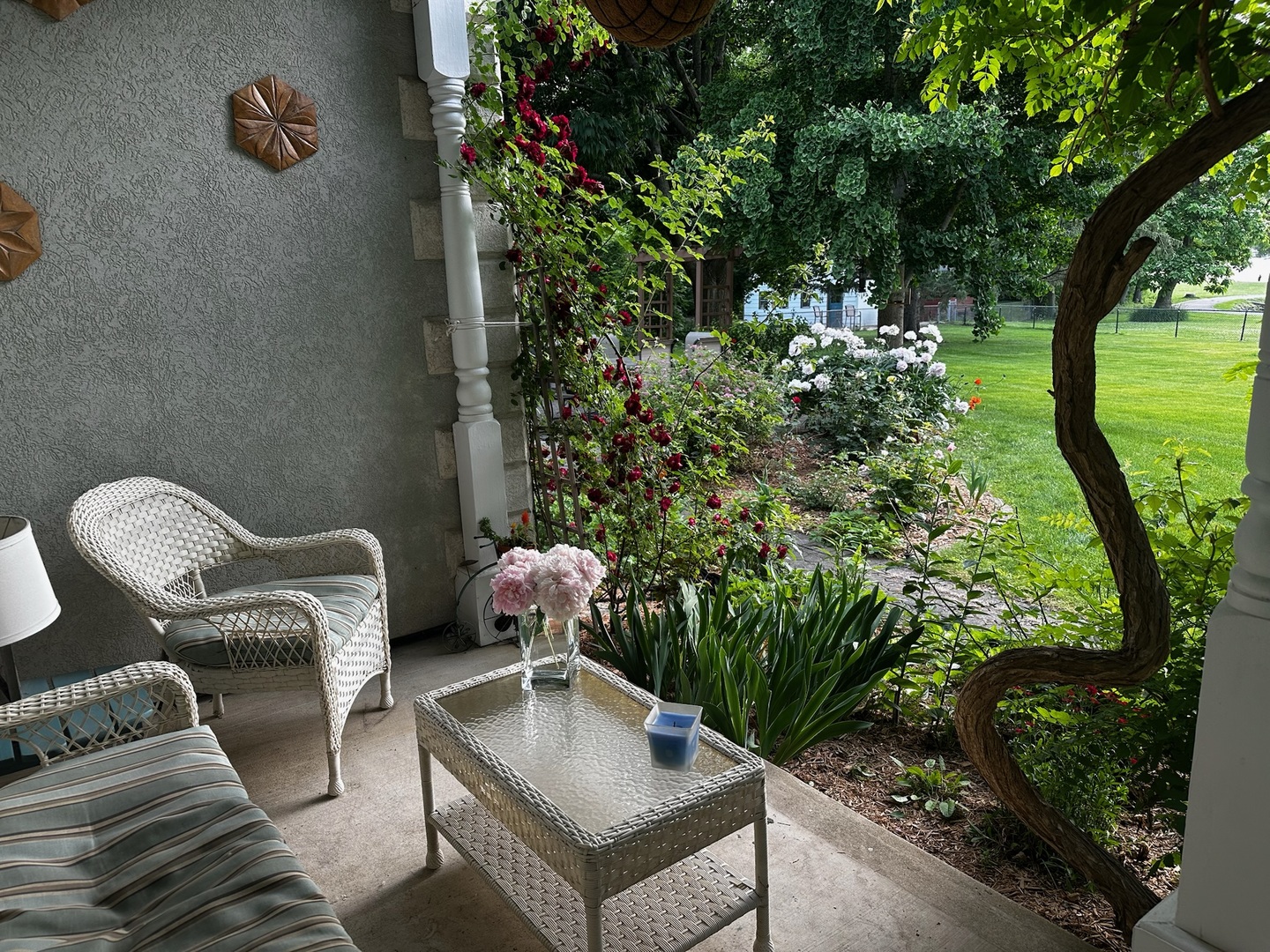 101 Beachway Drive Fox River Grove, IL 60021 - Photo 27 of 28 a backyard of a house with table and chairs