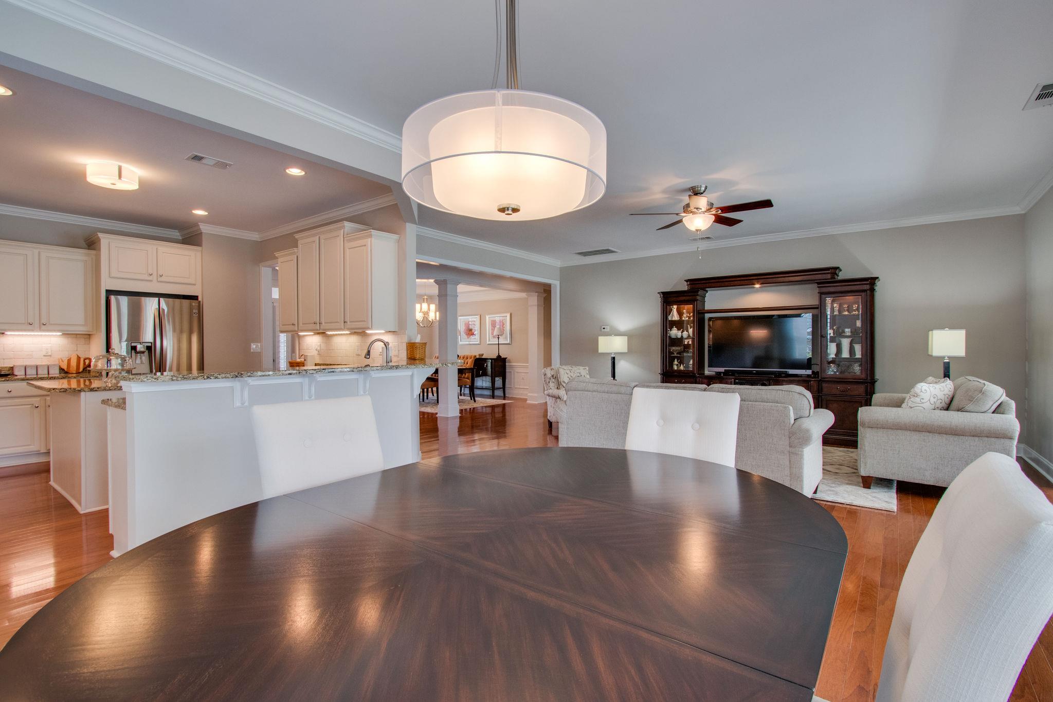 520 Bugler Road Mount Juliet, TN 37122 - Photo 17 of 30 a view of a living room and kitchen with furniture wooden floor