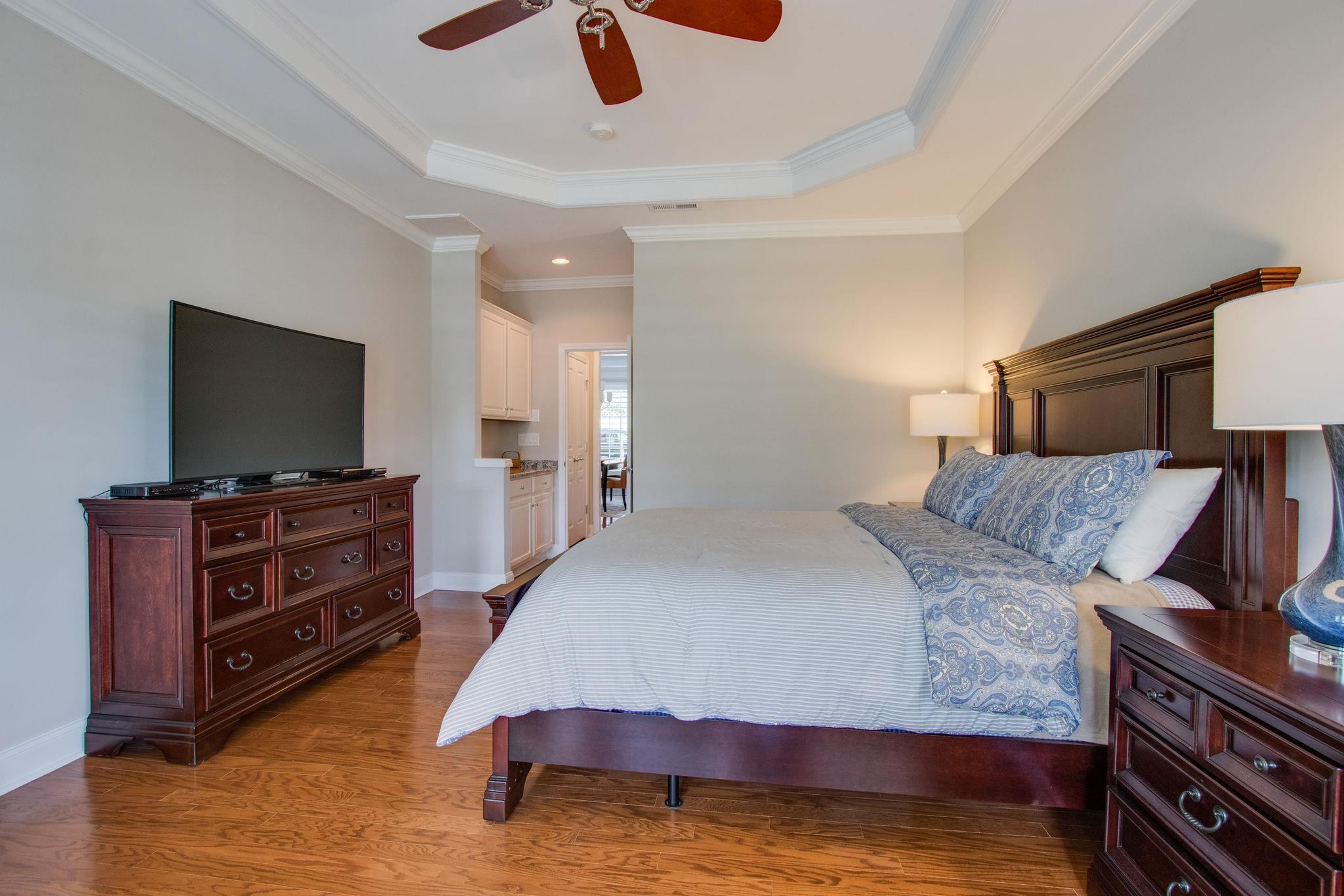 520 Bugler Road Mount Juliet, TN 37122 - Photo 20 of 30 a bedroom with a bed and a flat screen tv