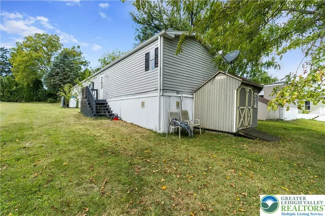 a view of a backyard with a garden