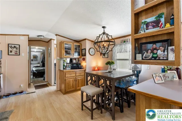 a view of a center kitchen island and furniture