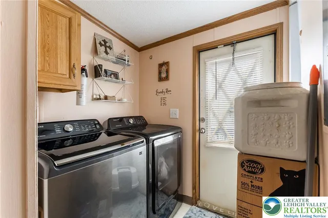 a kitchen with stainless steel appliances granite countertop a stove and a refrigerator