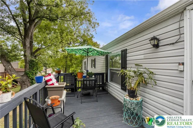a patio with table and chairs
