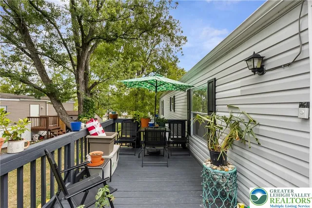 a view of a patio with furniture
