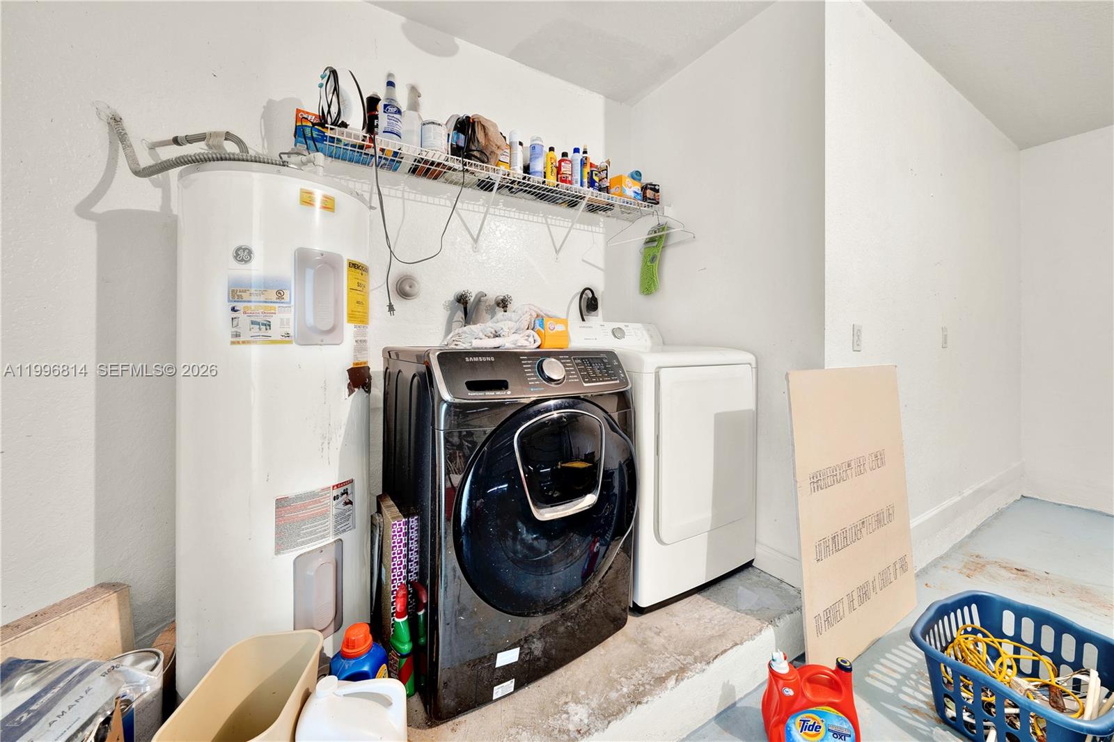 12046 Southwest 133rd Terrace Miami, FL 33186 - Photo 27 of 27 a utility room with dryer and washer
