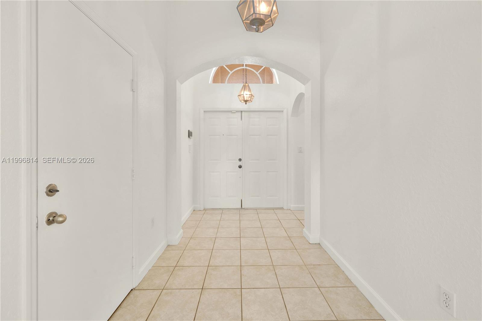 12046 Southwest 133rd Terrace Miami, FL 33186 - Photo 7 of 27 a view of empty room with wooden floor