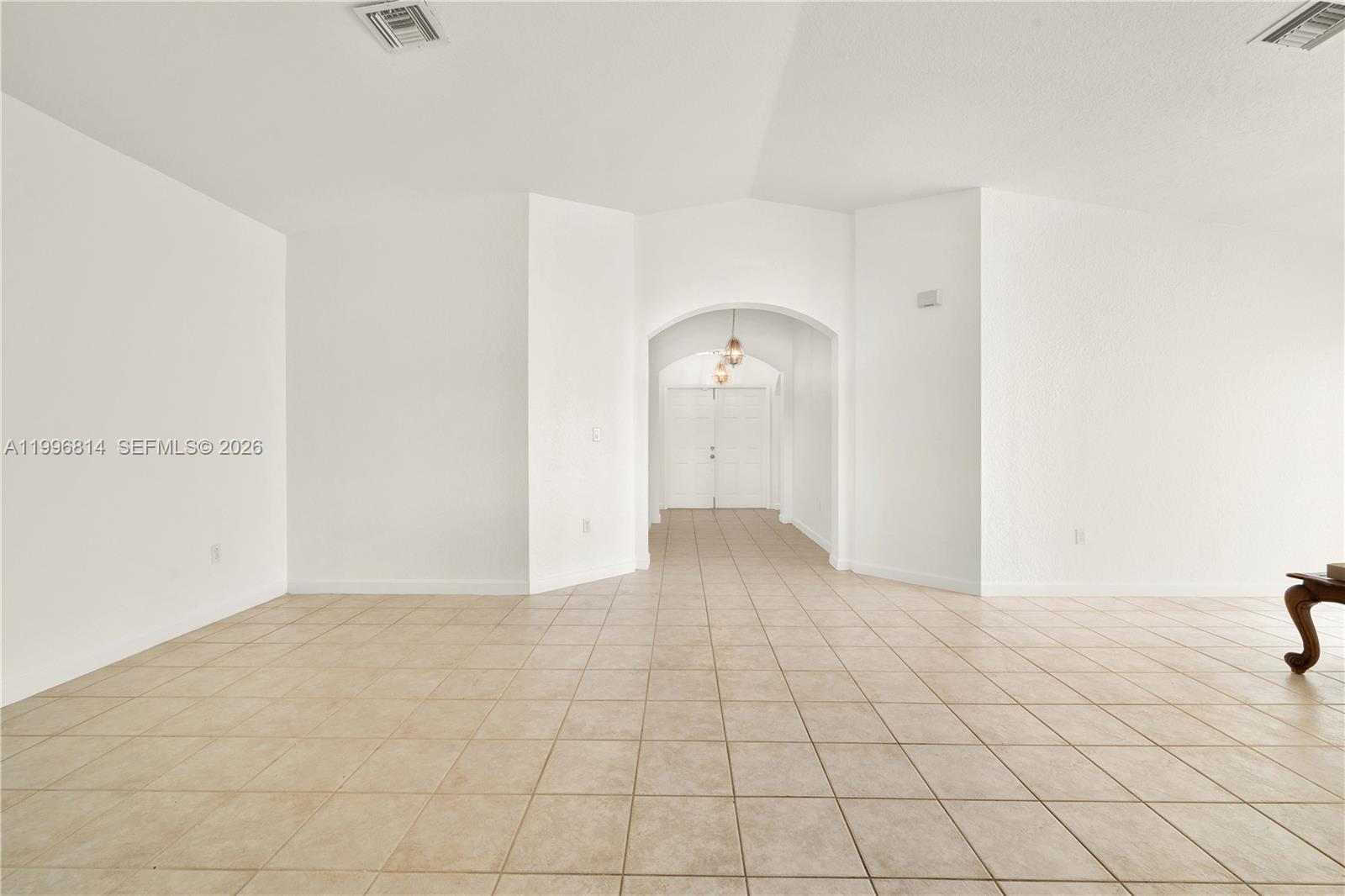 12046 Southwest 133rd Terrace Miami, FL 33186 - Photo 8 of 27 a view of an empty room