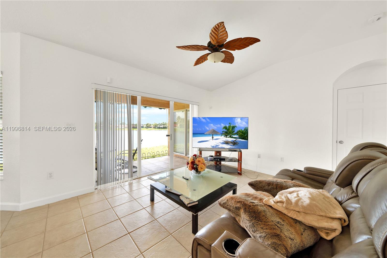 12046 Southwest 133rd Terrace Miami, FL 33186 - Photo 10 of 27 a living room with furniture