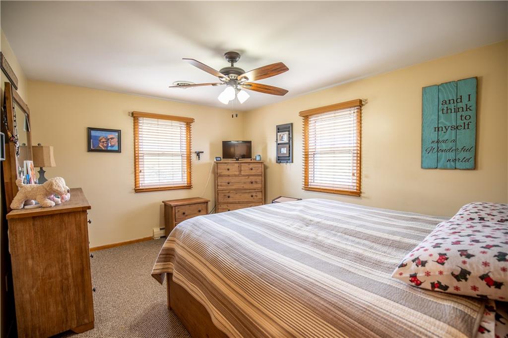 156 Jackson Road New Salem, PA 15468 - Photo 11 of 14 a bedroom with a bed and a dresser