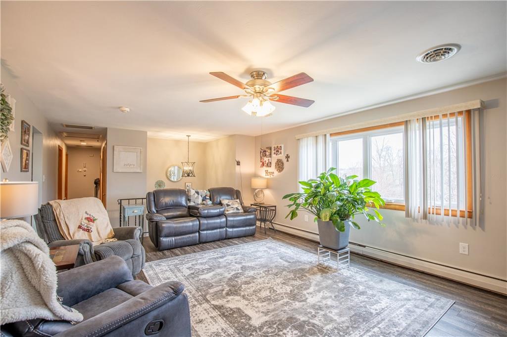 156 Jackson Road New Salem, PA 15468 - Photo 5 of 14 a living room with furniture and a large window