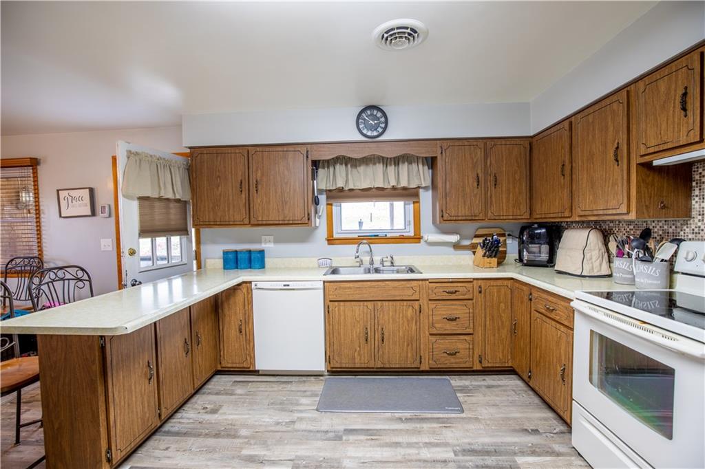 156 Jackson Road New Salem, PA 15468 - Photo 7 of 14 a kitchen with a sink cabinets and window