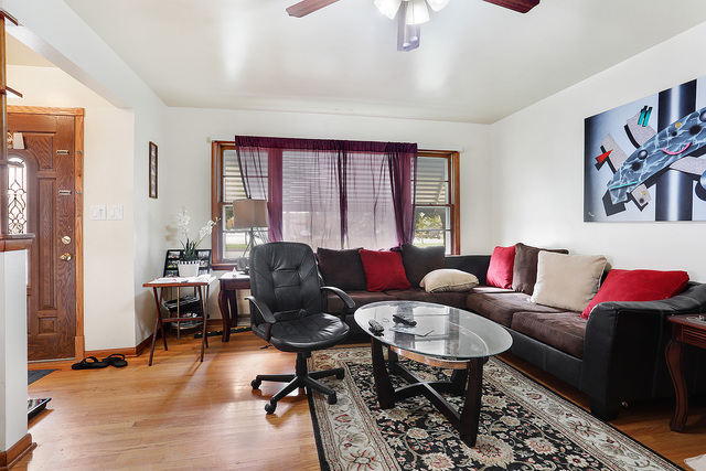 21W502 Army Trail Road Addison, IL 60101 - Photo 4 of 10 a living room with furniture and a window