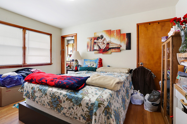 21W502 Army Trail Road Addison, IL 60101 - Photo 6 of 10 a bedroom with a bed and a window