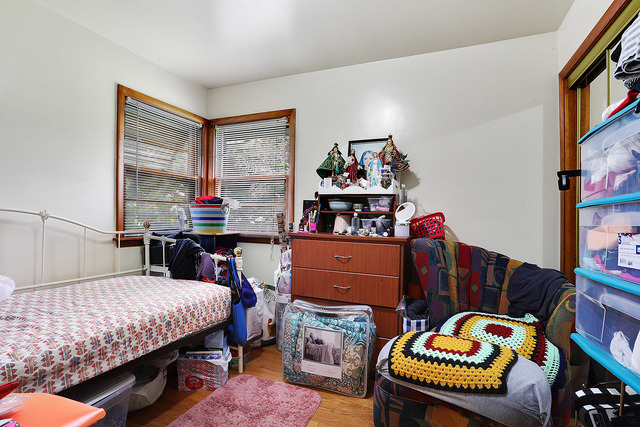 21W502 Army Trail Road Addison, IL 60101 - Photo 7 of 10 a bedroom with furniture and a baby crib