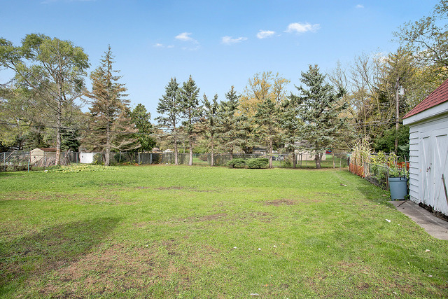21W502 Army Trail Road Addison, IL 60101 - Photo 8 of 10 a view of a green field