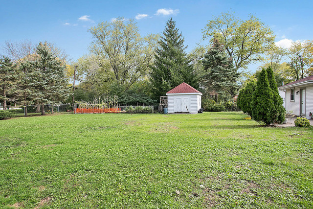 21W502 Army Trail Road Addison, IL 60101 - Photo 10 of 10 a house with garden
