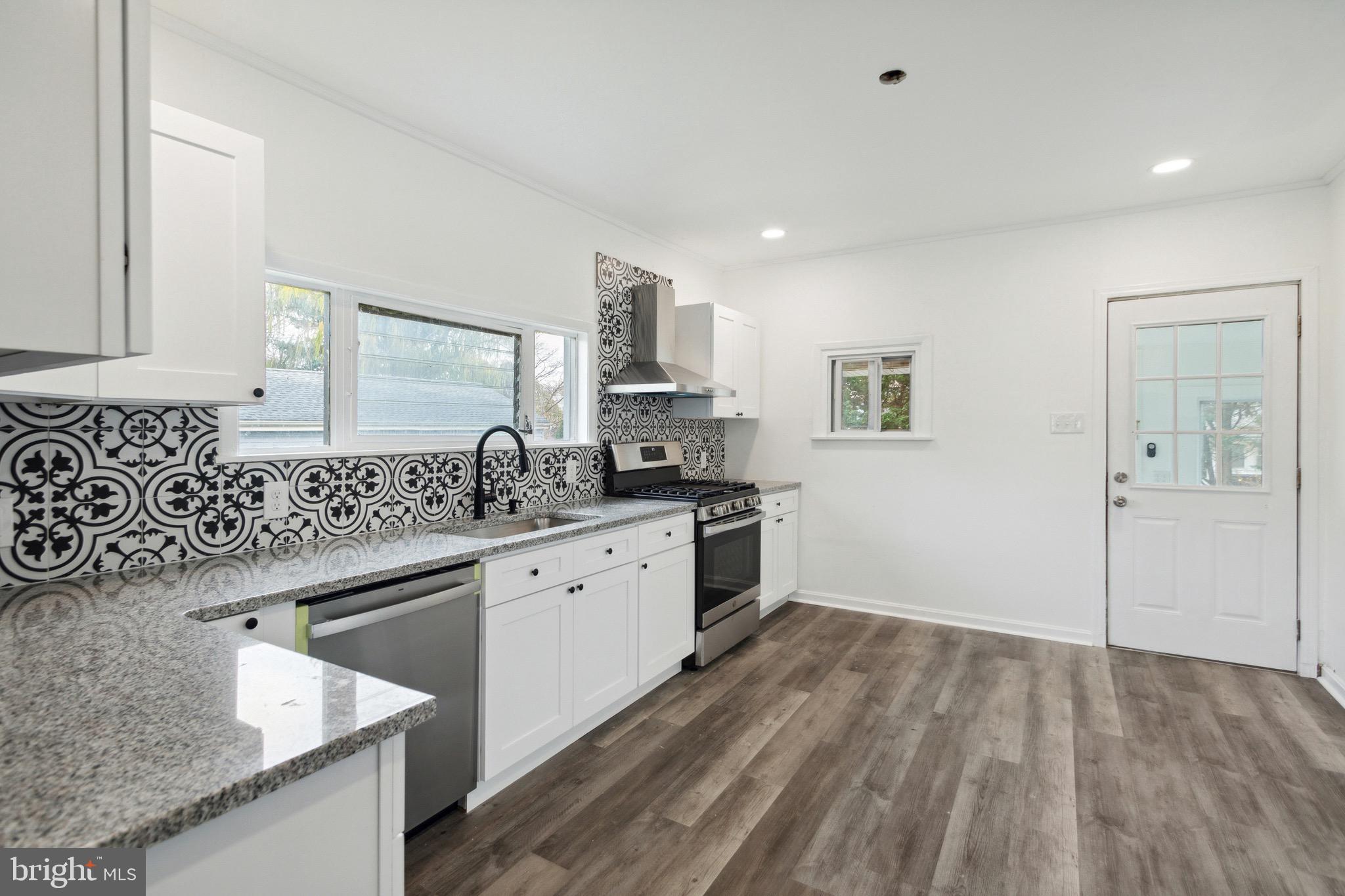 29 Nicholson Road Mount Ephraim, NJ 08059 - Photo 13 of 25 Access to Back Patio right from the Kitchen