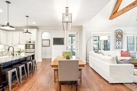 a fireplace with a clock on the wall