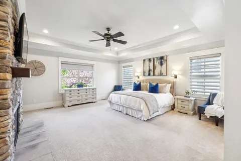 a living room with furniture gym equipment and a window