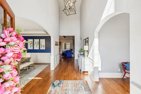 a view of a dining room with furniture and window