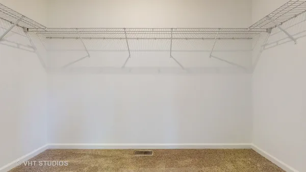 a view of a room with racks on the wall