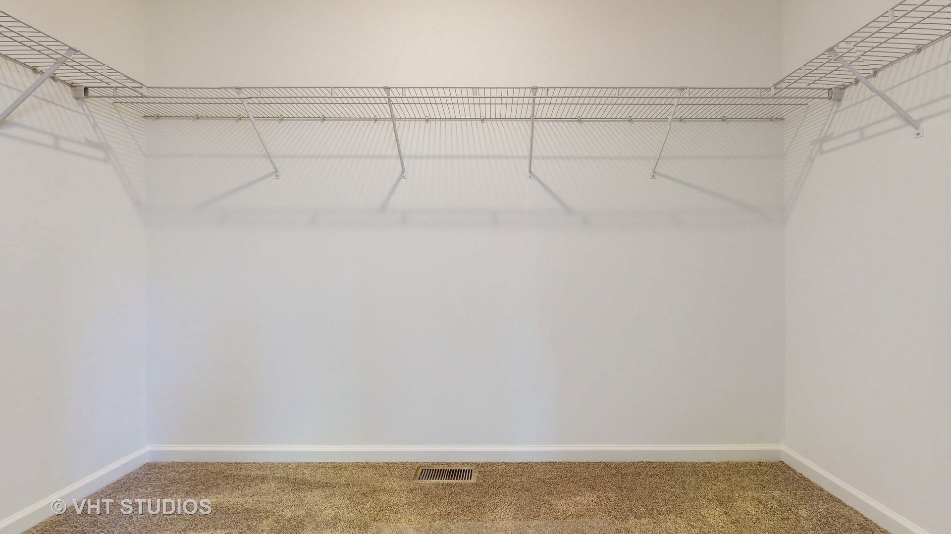 593 Farm Street Crete, IL 60417 - Photo 16 of 28 a view of a room with racks on the wall