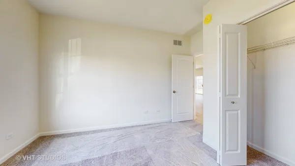 a bathroom with a sink a toilet and vanity