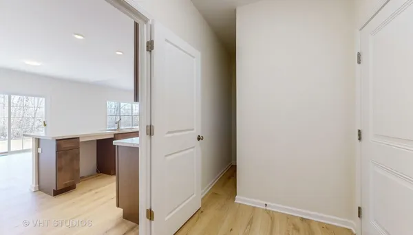 a view of a room with wooden walls