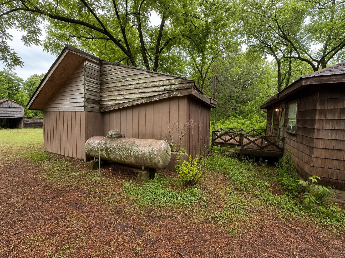 6760 Locke Road Millington, TN 38053 - Photo 22 of 31 a backyard of a house with lots of green space