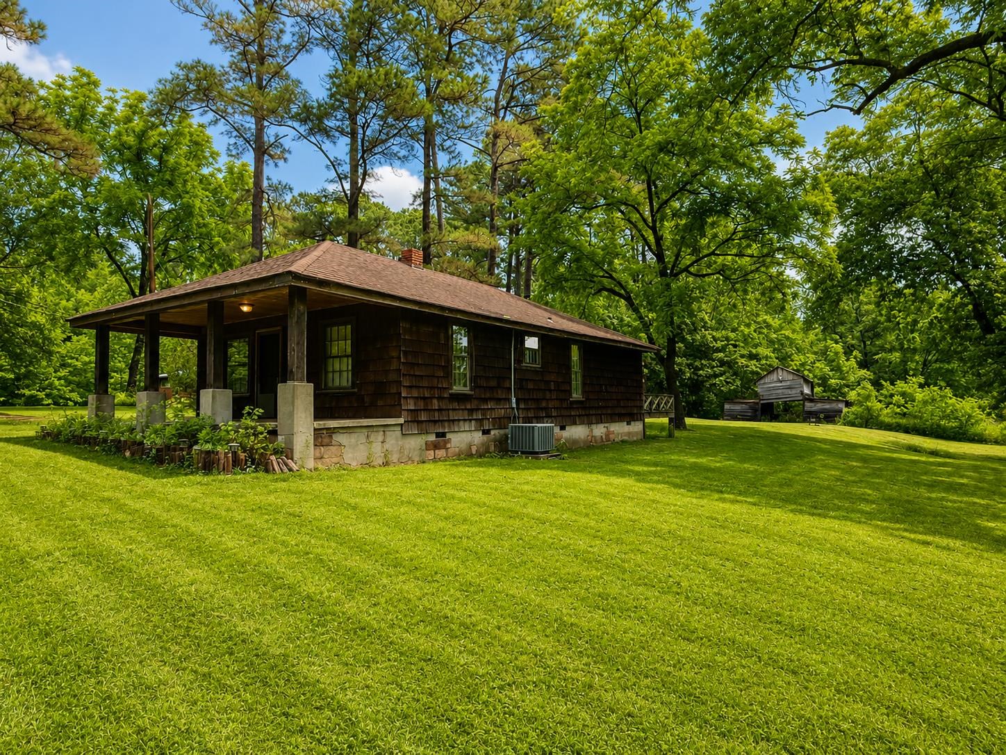 6760 Locke Road Millington, TN 38053 - Photo 25 of 31 a front view of house with yard and green space