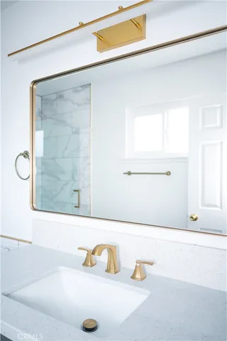 a bathroom with a tub and a shower