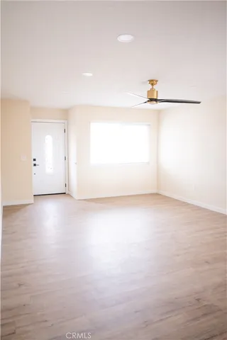 a view of a refrigerator in a room